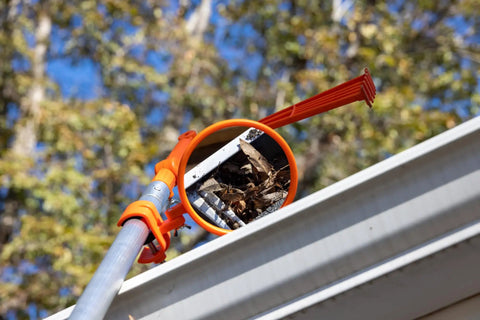 Expandable Inspection Mirror On A Pole For Roofs Gutters Ductwork Under Vehicle And Car Inspections in use showing gutter debris