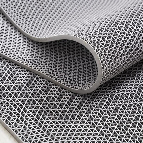 Close-up of grey Heavy Duty PVC Drainage Mat Grippy Non Slip Wet Area Floor Mat Roll 3 By 16.4 Ft 0.22 Inch Thick showing texture.