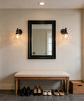 Industrial Vintage Wall Sconce Light Fixture With Slope Pole Mount And Funnel Flared Clear Glass Shade, Matte Black Finish in hallway