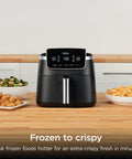 Game Changer 5 Quart Air Fryer With 5In1 Cook Functions For Insanely Crispy Results At 1750 Watts, sleek black design with food.