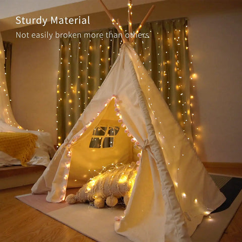 Tent illuminated with 200 LED Battery Operated Fairy Lights With Remote, 66Ft Silver-Coated Copper Wire, 8 Modes, warm white glow