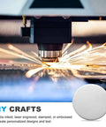 Laser engraving machine working on Stainless Steel Disc Blanks For Engraving Five Eighths Inch Diameter 0.08 Inch Thick Round Metal Stamping Blanks Pack Of 55 For DIY Jewelry, Name Tags, Keychains And Crafts.
