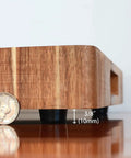 Side view of a wooden cutting board elevated by Non Slip Rubber Feet For Cutting Boards With Stainless Screws 12 Pack, showing height.