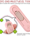 Retractable pink plastic box cutter for opening boxes, envelopes, and packages.