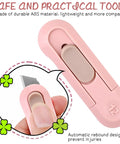 Close-up of a pink Ultra Sharp Retractable Box Cutter Set For Grab And Go Box And Envelope Opening, showing lightweight ABS material
