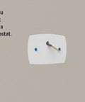 White Thermostat Wall Plate With Mount Bracket For 2x4 Electrical Box showing large cover plate on wall.