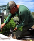 Gardener using Set Of 2 Knee Seats For Gardening, Strap On Kneeling Pads For One Leg Support, ergonomic outdoor work accessory.