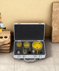 Solid 10-Piece Diamond Hole Saw Kit With Multi-Size Drill Bits For Shattering Glass Tile And Marble Like A Boss In Any Home Reno Job, open case with assorted bits and drill cutting stone