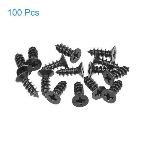 Heavy Duty M4 X 12mm Phillips Flat Head Self Tapping Wood Screws Black Carbon Steel With Rust Resistant Finish Slick Threading For Tough Weekend Builds 100 Pcs laid out, showcasing Phillips flat head design.