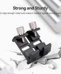 Universal Dovetail Base Finder Scope Mount Bracket on cracked surface, durable aluminum construction, for telescopes