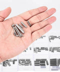 Hand holding 200 Piece Roll Pin Set Slotted Spring Pins 304 Stainless Steel Handy Assortment For Home Upgrades Automotive Repair.