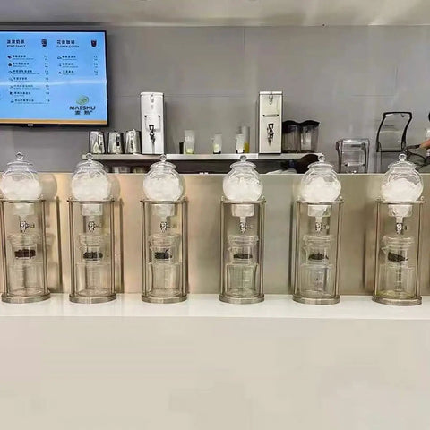 Premium Cold Brew Drip Tower With Adjustable Flow Control Borosilicate Glass Carafe And Heavy Duty Stainless Steel 600Ml Portable iced coffee brewers lined up.
