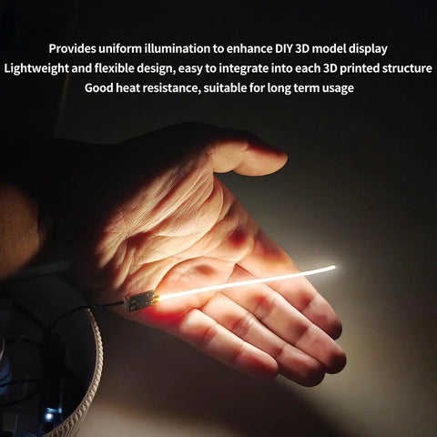 100mm Silicone COB LED Strip Light With PCB Interface Board Kit for 3D Printer Accessories held in hand showing size and glow