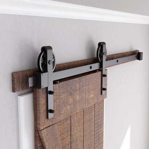 Beefy Heavy Duty Sliding Barn Door Hardware Kit 5ft Black With Pull Handle Set And Floor Guide Fits 30 Inch Wide Door Panel Big Industrial Wheel Hangers Supports Up To 220 Lb installed on wooden door