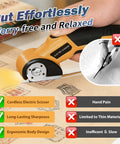 Heavy Duty Electric Cardboard Scissors With LED Light And Safety Lock Tungsten Steel Blade 2000Mah Battery in use cutting paper.