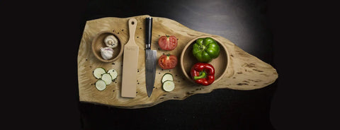 Pro Grade Leather Knife Strop With Double Sided Stropping Leather And Polishing Compound Handmade In Poland on cutting board