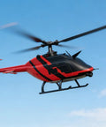 C138 Red And Black Remote Control Helicopter With 6CH 6 Axis Gyro Beginner Friendly Easy Hover Single Wing Up Down Left Right Flight Route Flight Dual Batteries Suitable For Adults 14 Plus flying in blue sky.