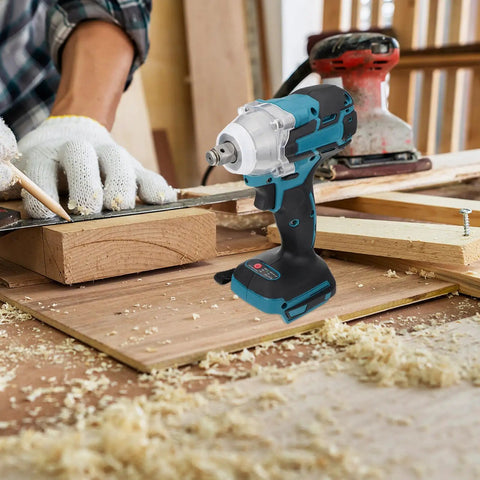 Heavy Duty Cordless Brushless Impact Wrench Kit With Rechargeable Battery, 520Nm Torque Quick Change Chuck on construction workbench.