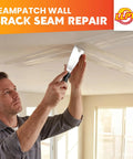 Pro Grade Drywall Repair Fiberglass Tape 2 Inch By 100 Foot Industrial Grade Extra Strength Heavy Duty Self Adhesive Seam Patch For Wall Cracks And Ceiling Joints White Fiber Mesh DIY Friendly DRF210 being applied to ceiling joint.