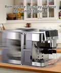 Front view of Ninja espresso machine with transparent acrylic sliding tray accessory on kitchen counter.