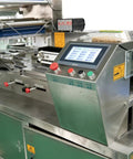 Control panel of Flow Wrapper Compact Packaging Machine With 50 To 80 Pieces Per Minute, Space Saving Flow Packaging Equipment.