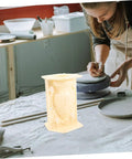 Woman using Roman Column Balustrade Mold For DIY Concrete Projects, Lightweight And Easy Release, 8.26 x 5.90 x 5.51 Inches in workshop