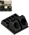 Close-up of Kick Your Daily Brew Game Up With This Smooth Operator Desktop Coffee Station Organizer in black, showing compartments for coffee tools.