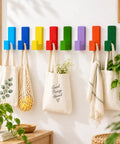 Fresh Rainbow Wooden L Shaped Wall Hooks Eight Pack With Adhesive Pads And Screws Vibrant Multicolor Storage Rack For Kitchen Or Entryway Pretty Sweet Finish Totally Rad Quality. Colorful hooks with bags and plants.
