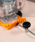 Top Shelf Adjustable Router Circle Cutting Jig And Template System with orange base and adjustable guide for precise cuts.