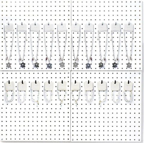 20 Pack Black Pegboard Picture Hangers For One Eighth And One Quarter Inch Boards With U Shape Prong Design displayed on pegboard