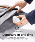 Person placing All In One Charging Station For Apple Watch IPhone And AirPods With Built In Wireless Charger in a gray bag