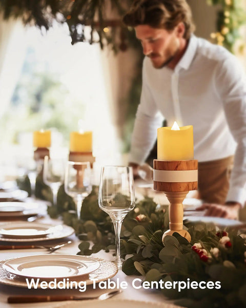 Wedding table with 24 Pack Flameless Votive Candles Tealights Warm White Ivory Base Christmas Decor arranged as centerpieces.