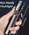 Hand holding a 5.3-inch Rechargeable LED Flashlight with Digital Power Display and Zoomable Beam, USB C Charging