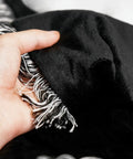 Close-up of black Two Pack 40 By 60 Inch Sublimation Blankets For Heat Press Baby Printed Throw 100 Percent Polyester with fringe