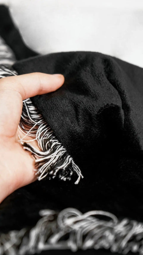 Close-up of black Two Pack 40 By 60 Inch Sublimation Blankets For Heat Press Baby Printed Throw 100 Percent Polyester with fringe