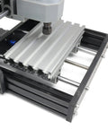 CNC1610 Pro 3 Axis GRBL Control DIY Mini CNC Router Kit with aluminum frame and spindle motor, close-up of work area.