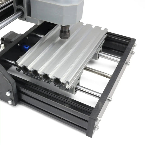 CNC1610 Pro 3 Axis GRBL Control DIY Mini CNC Router Kit with aluminum frame and spindle motor, close-up of work area.