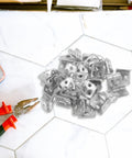 Top Shelf Couch Spring Clips And Sofa Fasteners Bundle Includes One Hundred Rubber Anchors And Sectional Connectors To Smooth Out Your Rattling Sofa And Kill Those Squeaks - pile of metal clips on a tiled surface.