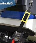 2 Inch Ratchet Strap Protectors for Trailer Tie Downs in use on boat, showing protective sleeves and heavy duty buckle securing boat