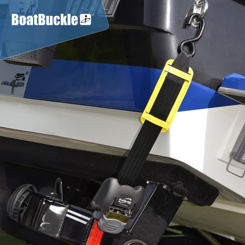 2 Inch Ratchet Strap Protectors for Trailer Tie Downs in use on boat, showing protective sleeves and heavy duty buckle securing boat