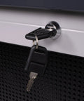 Close-up of lock with key on 67 Inch Lockable Garage Tool Panel With Aluminum Shutter And Three Perforated Panels, Beefy Wall Mount