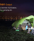 Camping scene with a green tent and people using CL30R Camping Lantern With 650 Lumens, USB Rechargeable for outdoor light.