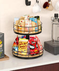 Two-Tier Lazy Susan Snack Organizer With Grab-and-Go Design, holding snacks in beech wood and metal, on a counter
