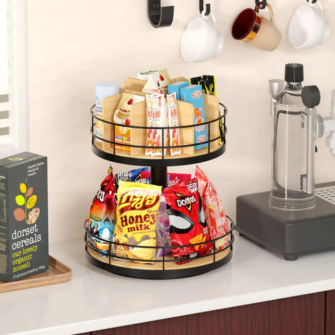 Two-Tier Lazy Susan Snack Organizer With Grab-and-Go Design, holding snacks in beech wood and metal, on a counter