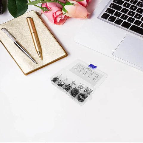 Stainless Steel Retaining Rings Kit With Easy Removal Clips Wear Resistant Snap Rings Assortment In 10 Sizes From 1.5mm To 10mm In A Durable Plastic Storage Box For Professional Projects And Routine Maintenance. Open storage box with assorted snap rings and easy removal clips