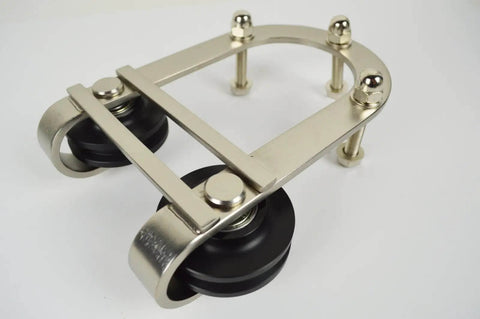 Close-up of Stainless Steel 6 Foot Barn Door Track Hardware Kit featuring rollers, part of the heavy duty wall mounted rail system for sliding doors.
