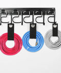 Heavy Duty Metal Garage Tool Organizer Wall Mount Kit Four Pack With Extension Cord Straps holding cables