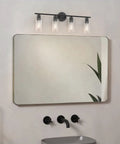 Matte Black 4 Light Vanity Light Over Mirror Dope Modern Sconce With UL Certified E26 Base in bathroom setting.