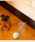 12 Pack Under Couch Blocker Black Pet Barrier Strip To Lock Down Your Sofa Gap and Keep Dogs From Crawling Beneath Furniture With Strong Peel Adhesive Backing And Reusable Guard near a toy dog, clear object, and golf ball.