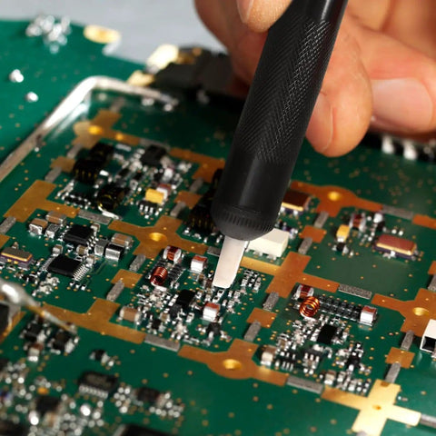 Using Six Piece Soldering Assist Set Desoldering Pump And Wick Kit For PCBs One Handed Solder Aid Tools on a circuit board